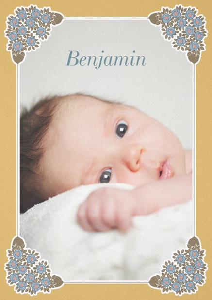 Birth announcement photo card with golden and floral art-nouveau frame.